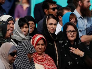 New Zealand marks one week since mosque attack with prayers, silence and headscarves 