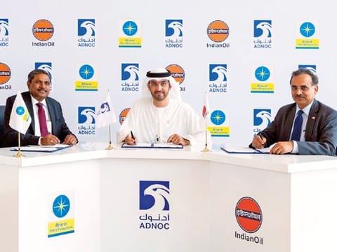 Sultan Ahmad Al Jaber with Bharat Petroleum and Indian Oil Corp executives during a signing ceremony.