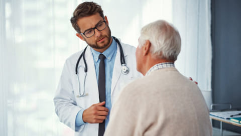 A doctor treats a patient. For illustrative purposes only.