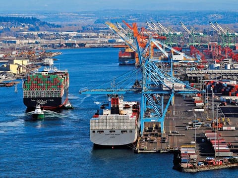 Container ships at the Port of Tacoma. The economy is facing headwinds from the fading stimulus and slowing global growth. Former US Treasury Secretary Larry Summers said he's never seen a more uncertain recovery.