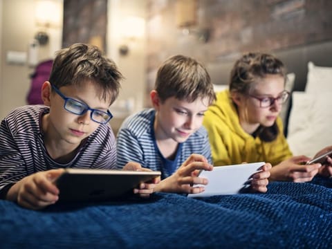 Children playing video games online