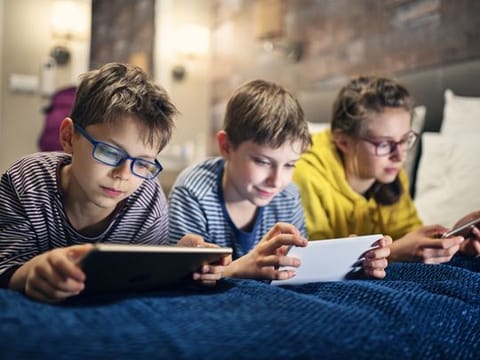 Children playing video games online