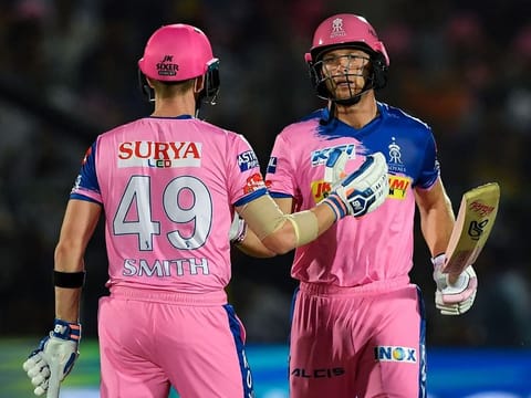 Rajasthan Royals' Jos Buttler (right) is congratulated by his teammate Steve Smith after completing a half-century in IPL 2019.