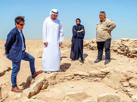 Mohammad Khalifa Al Mubarak and other officials at the dig site situated on top of a rocky limestone plateau to the west of Ghubba village on Marawah island.