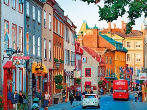 Old street with traffic in Quebec City, Canada.