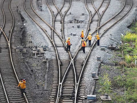 Workers inspect railway tracks, which serve as a part of the Belt and Road freight rail route linking Chongqing to Duisburg, at the Dazhou railway station in Sichuan province, China (File image) 