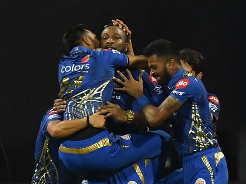 Mumbai Indians cricketers in jubilation after clinching a thrilling victory in the IPL 2019 final.