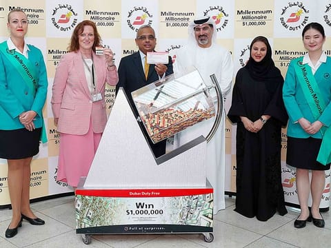 Dubai Duty Free officials pick the latest winner of $1 million.