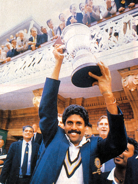 Indian captain Kapil Dev poses with the World Cup trophy at Lord's on March 25, 1983.