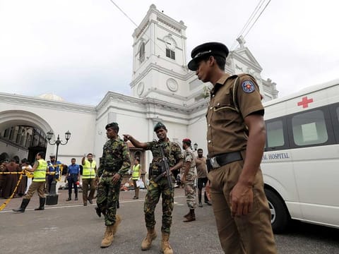 Sri Lankan military officials stand guard in front of the St. Anthony's Shrine, Kochchikade church after an explosion in Colombo, Sri Lanka April 21, 2019. 