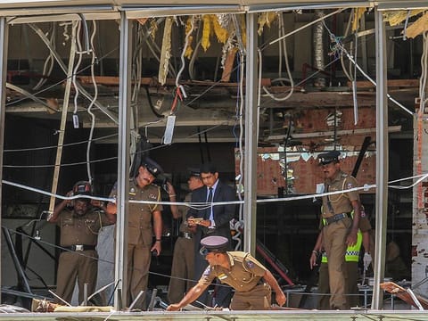  a Sri Lankan Police officer inspects a blast spot at the Shangri-la hotel in Colombo, Sri Lanka. Sri Lankan authorities blame seven suicide bombers of a domestic militant group for coordinated Easter bombings that ripped through Sri Lankan churches and luxury hotels 