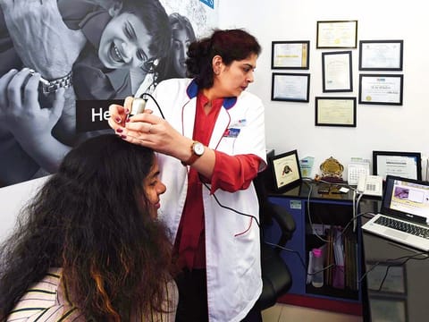 Dr. Usha Khatri giving treatment to a patient at the Batra clinic Dubai Healthcare City yesterday. Many people now resort to homeopathy treatment as first choice.