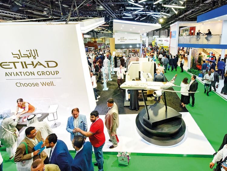 People at Etihad Airways at Arabian Travel Market