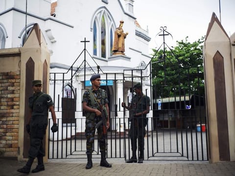 Soldiers stand guard a closed church in Colombo on April 28, 2019, a week after a series of bomb blasts targeting churches and luxury hotels on Easter Sunday in Sri Lanka. Sri Lanka's Roman Catholic leader condemned the Easter attacks as "an insult to humanity" as the country marked a week since suicide bombers hit three churches and three luxury hotels. 