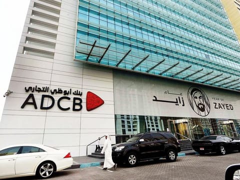 ADCB headquarters in Abu Dhabi. ADCB and UNB have merged and then acquired Al Hilal. The new entity will retain the name ADCB and will trade on Abu Dhabi bourse under that ticker.