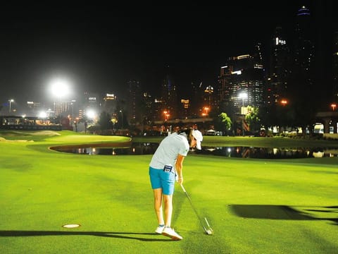 Leona Maguire tees off from the 18th hole on Day One of the Omega Dubai Moonlight Classic at Emirates Golf Club on Wednesday, in Dubai.