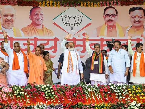 Prime Minister Narendra Modi with Uttar Pradesh Chief Minister Yogi Adityanath, BJP Lok Sabha candidates and other leaders wave at supporters during an election rally for Lok Sabha polls, in Ayodhya, onWednesday, May 1, 2019. 