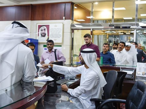 Employees at work at the General Directorate of Residency and Foreign Affairs (GDRFA) in Dubai. Picture for illustrative purposes only.