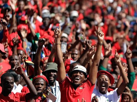 Supporters of the Economic Freedom Fighters (EFF) party, attend their election rally at the Orlando Stadium in Soweto, South Africa, Sunday, May 5, 2019, ahead of South Africa's election on May 8. 