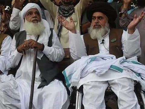 Khadim Hussain Rivzi, Chief of Tehreek-e-Labbaikh Pakistan (TLP) and Pir Afzal Qari, Patron-in-Chief of the TLP during a protest rally against the Supreme Court' verdict to acquit Asia Bibi last year.