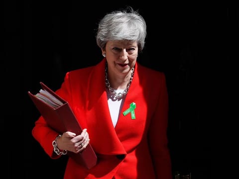 Britain's Prime Minister Theresa May leaves 10 Downing Street for her weekly Prime Minister's Questions in the House of Commons in London.