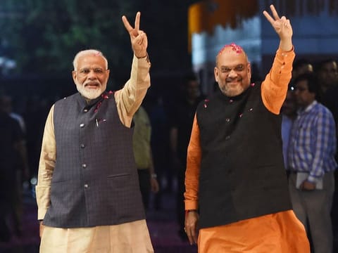 India Prime Minister Narendra Modi and BJP President Amit Shah celebrate the victory in India's general elections, in New Delhi. BJP uses the nationalism pitch selectively to win state elections.
