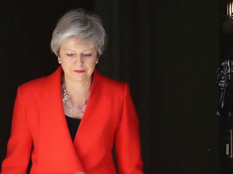 British Prime Minister Theresa May named 7 June as the day she will step aside as Conservative leader.