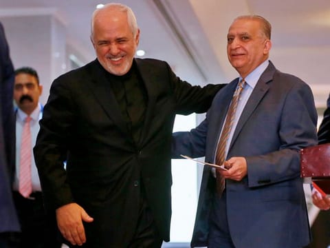 Iranian foreign minister Mohammed Javed Zarif (left) with his Iraqi counterpart Mohammed Al Hakim in Baghdad on May 26.