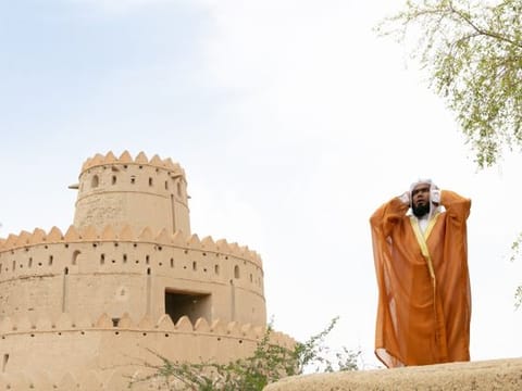 Traditional call to prayer at Al Jahili Mosque