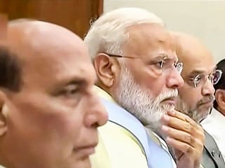 Prime Minister Narendra Modi with Union Ministers Rajnath Singh and Amit Shah during the Cabinet meeting, in New Delhi, on Friday, May 31, 2019. 