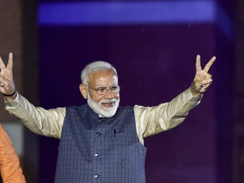 New Delhi: Prime Minister Narendra Modi flashes the victory sign as he arrives at the party headquarters to celebrate the party's victory in the 2019 Lok Sabha elections,  in New Delhi, Thursday, May 23, 2019. (PTI Photo/Ravi Choudhary) (PTI5_23_2019_000464B)