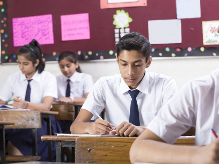 Indian school student writing exams-1559475389620