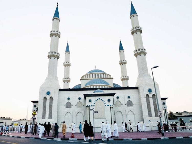 People attend the morning prayers