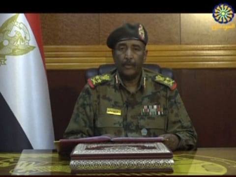 In this frame grab from video provided by Sudan TV, Lieutenant General Abdel-Fattah Burhan, head of the Sudanese Transitional Military Council, TMC, makes a broadcast announcement in Khartoum, Sudan, Tuesday, June 4, 2019. 