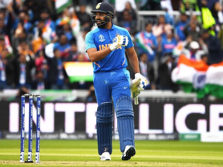India's Rohit Sharma celebrates after scoring a century