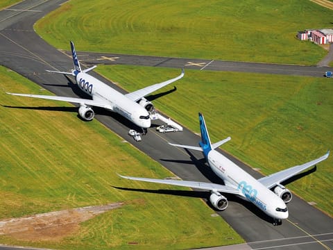 An Airbus A350-1000 and an Airbus A330 NEO are seen during the 53rd International Paris Air Show at Le Bourget Airport near Paris, France, June 17 2019. 