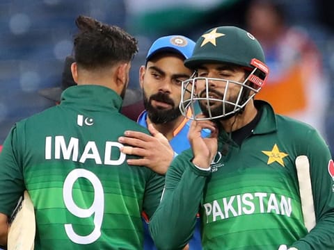 File photo: India's Virat Kohli greets Pakistan players at the end of the World Cup match between them at Old Trafford in Manchester. 