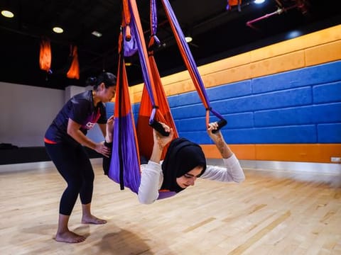 Learn how to do aerial yoga