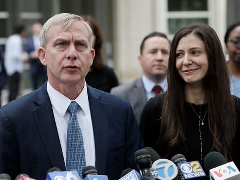 US Attorney Richard Donoghue, left, talks to the media with prosecutor Moira Penza outside Brooklyn federal court after NXIVM defendant Keith Raniere was found guilty on all counts, Wednesday, June 19, 2019.