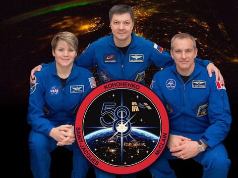 Anne McClain,  David Saint-Jacques and Oleg Kononenko