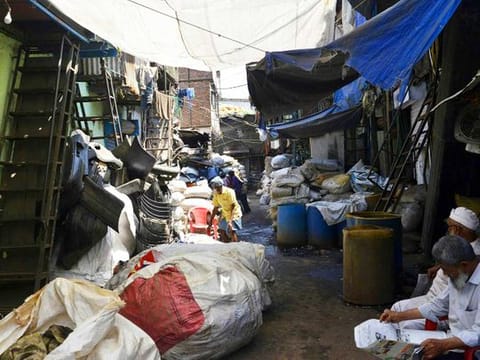 Sacks of plastic waste arranged outside a factory in Dharavi, Asia's largest slum in Mumbai