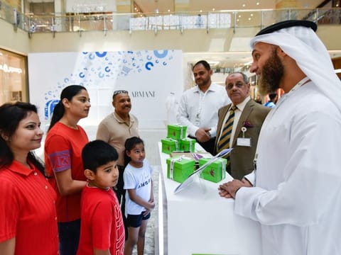 Faris Ahmad Al Hammadi speaks to residents during the campaign launched at Mirdif City Centre in Dubai.