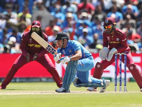 India's MS Dhoni bats during the World Cup match against West Indies at Old Trafford in Manchester, on Thursday, June 27, 2019. 