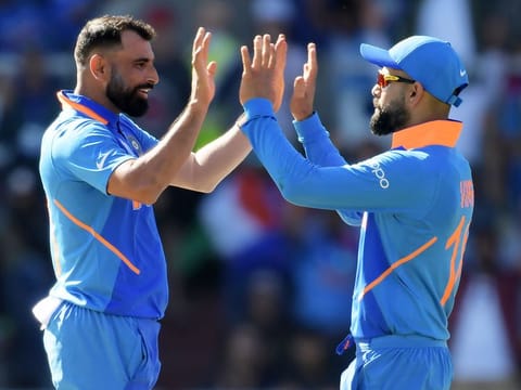 India's Mohammad Shami (left) with captain Virat Kohli.