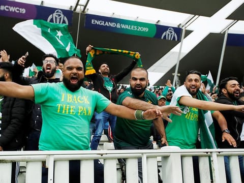 Pakistan fans cheer their team during the match against New Zealand at Edgbaston, Birmingham. 