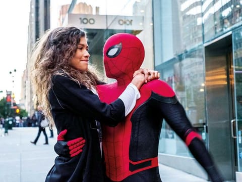 MJ (Zendaya) catches a ride from Spider-Man in "Spider-Man: Far From Home."