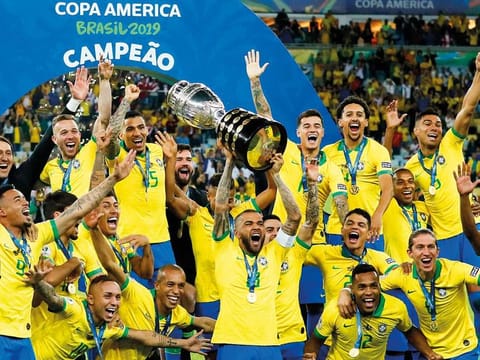 Brazili team celebrate with the Copa America trophy after defeating Peru in the final at the Maracana Stadium in Rio de Janeiro in 2019.