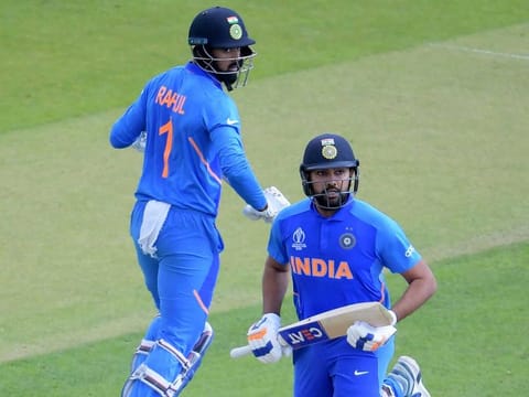 India's Rohit Sharma (R) and India's K.L. Rahul (L) take a run during the World Cup group stage match against Sri Lanka at Headingley in Leeds, on July 6, 2019.  