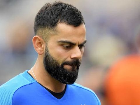 A disappointed India captain Virat Kohli after their defeat in World Cup semi-final. 