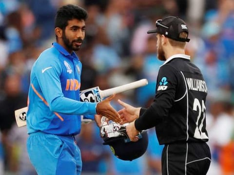  India's Jasprit Bumrah shakes hands with New Zealand's Kane Williamson after the match.